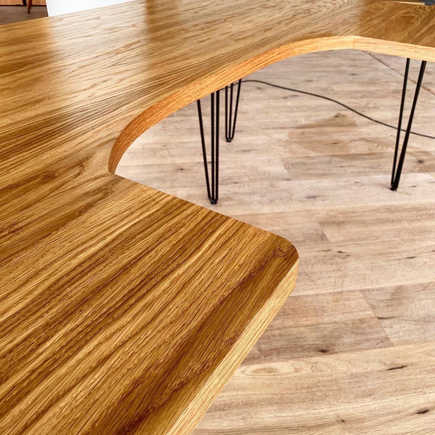 Curved oak table top on hairpin legs
